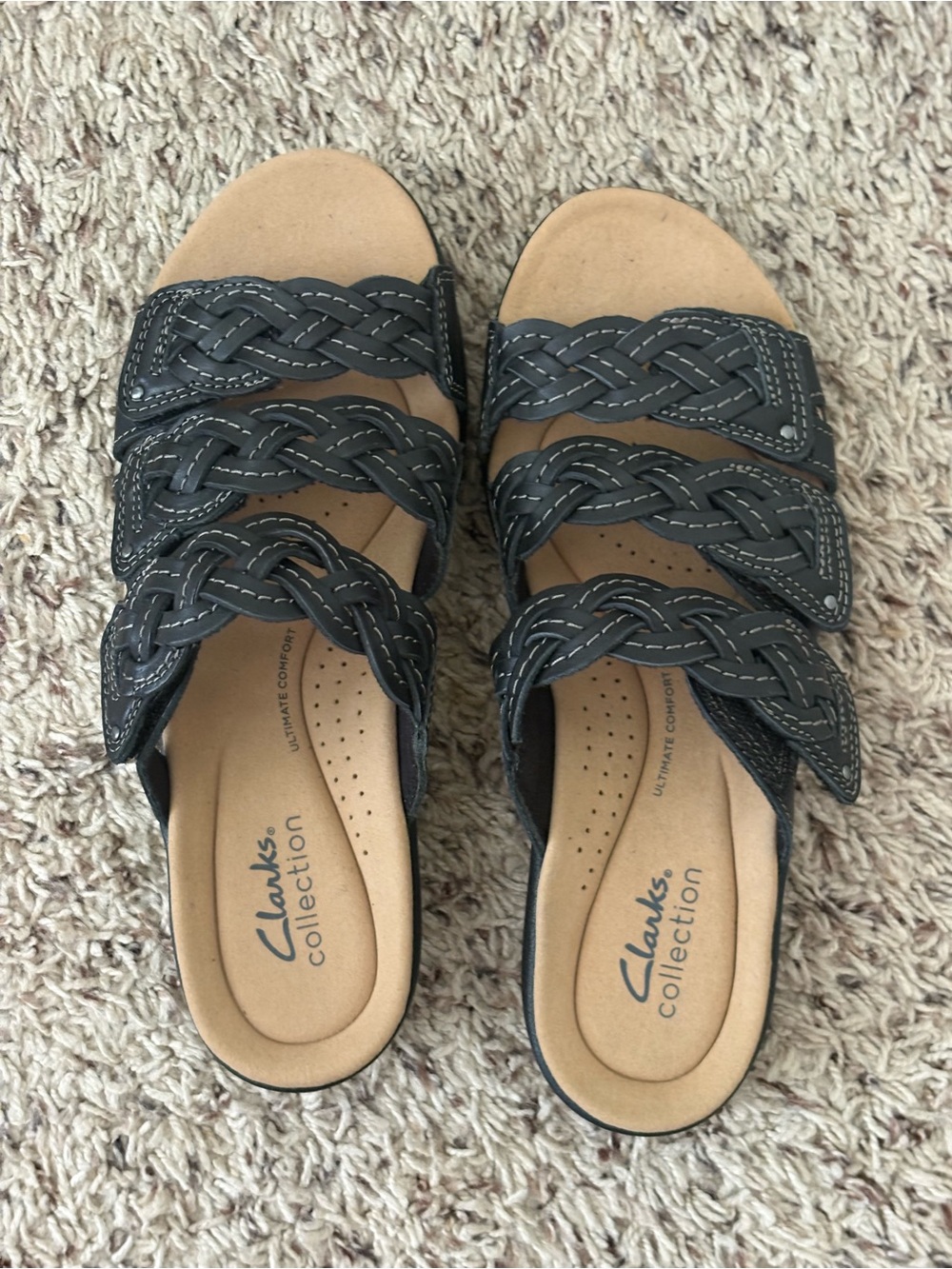 Clarks Collection Women's Leisa Faye flat sandals black leather woven straps.